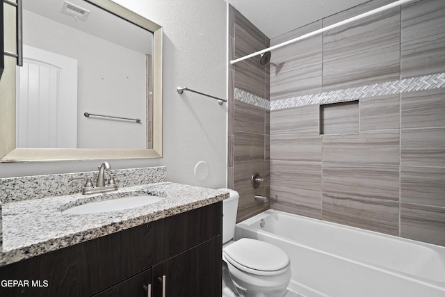 full bathroom with vanity, bathing tub / shower combination, toilet, and visible vents