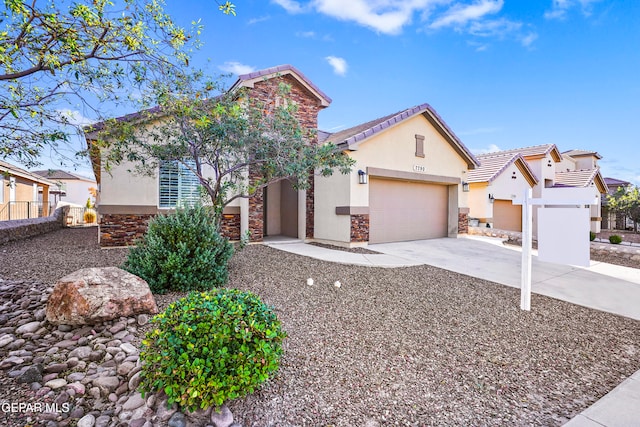 view of front of property with a garage