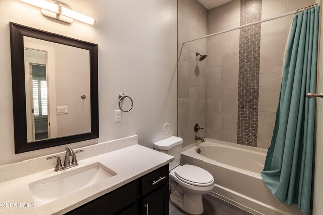 full bathroom with vanity, toilet, and shower / tub combo