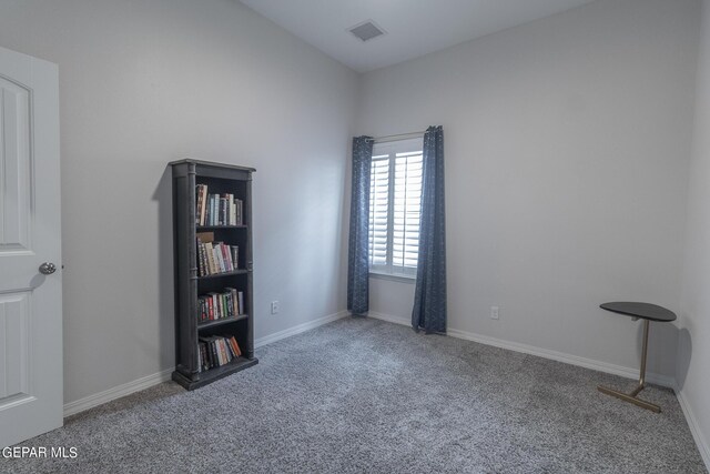 spare room with carpet floors