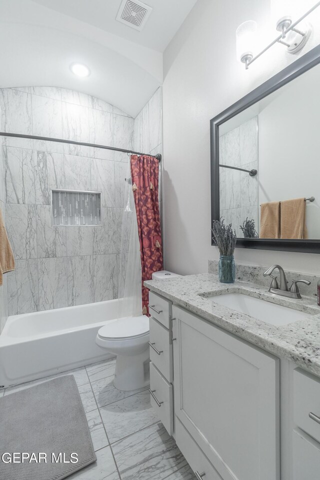 full bathroom with vanity, toilet, and shower / tub combo with curtain