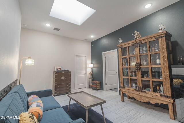 living room with a skylight