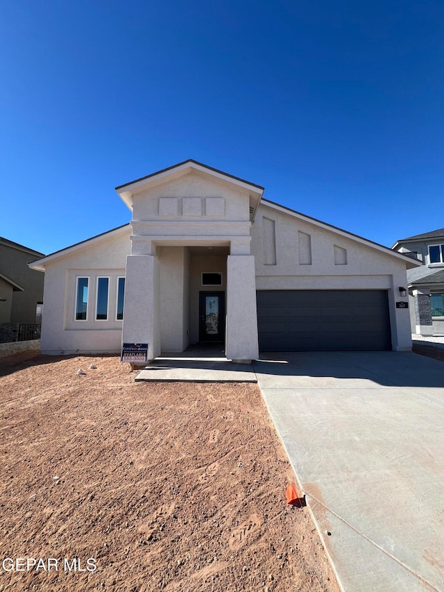 view of front of home with a garage