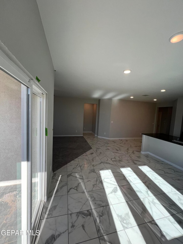 spare room featuring a wealth of natural light