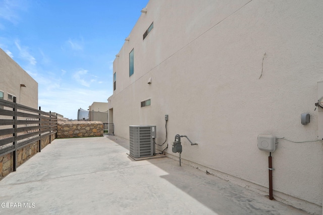 exterior space featuring central AC unit and a patio area