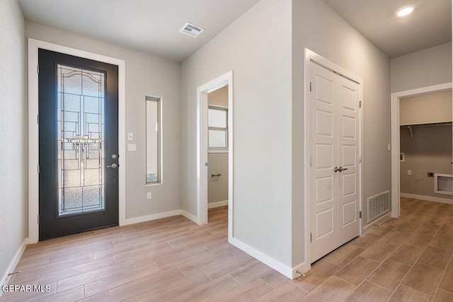 foyer entrance featuring light hardwood / wood-style flooring