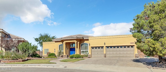 view of front of property featuring a garage