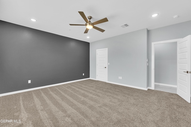 unfurnished bedroom with ceiling fan and carpet flooring