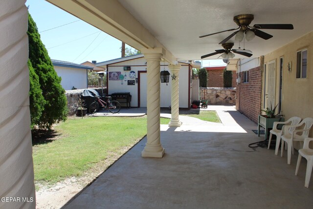 view of patio featuring ceiling fan