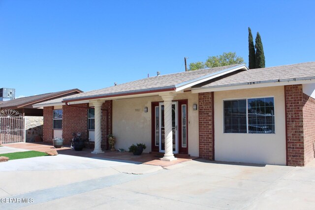 single story home featuring a patio area