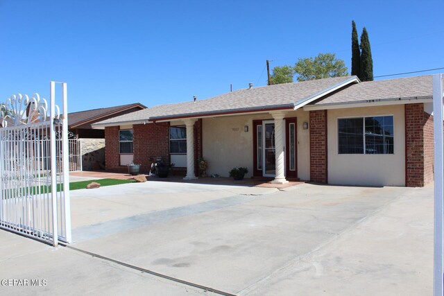 ranch-style home with a patio area