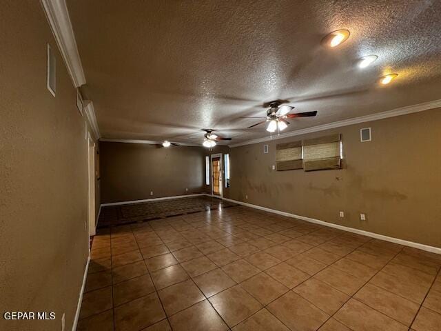 empty room with crown molding, tile patterned floors, ceiling fan, and a textured ceiling