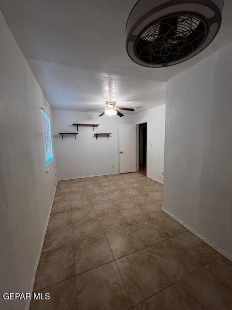 empty room with ceiling fan