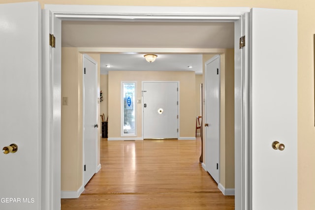 foyer entrance featuring light wood-type flooring