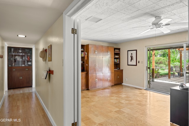 hall featuring light hardwood / wood-style floors