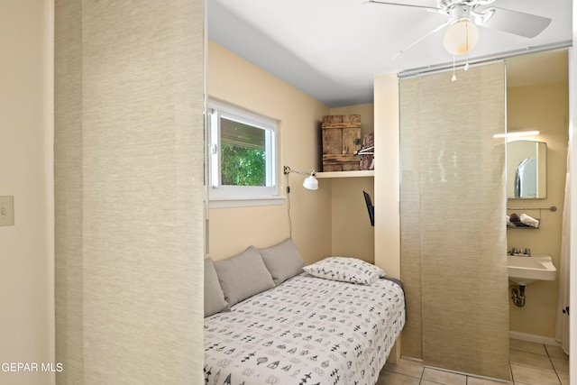 bedroom featuring ceiling fan and light tile patterned flooring