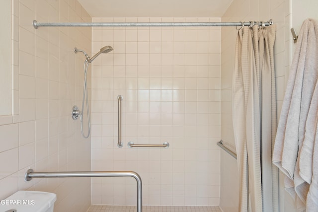 bathroom featuring a shower with curtain