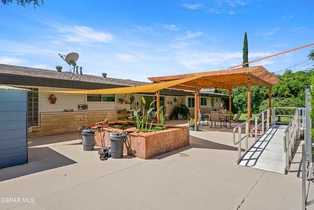 view of patio featuring a pergola