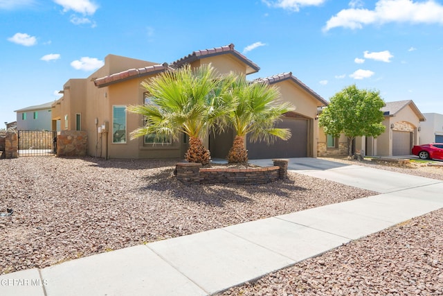 view of front of home with a garage