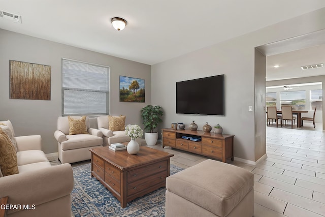 living room with ceiling fan