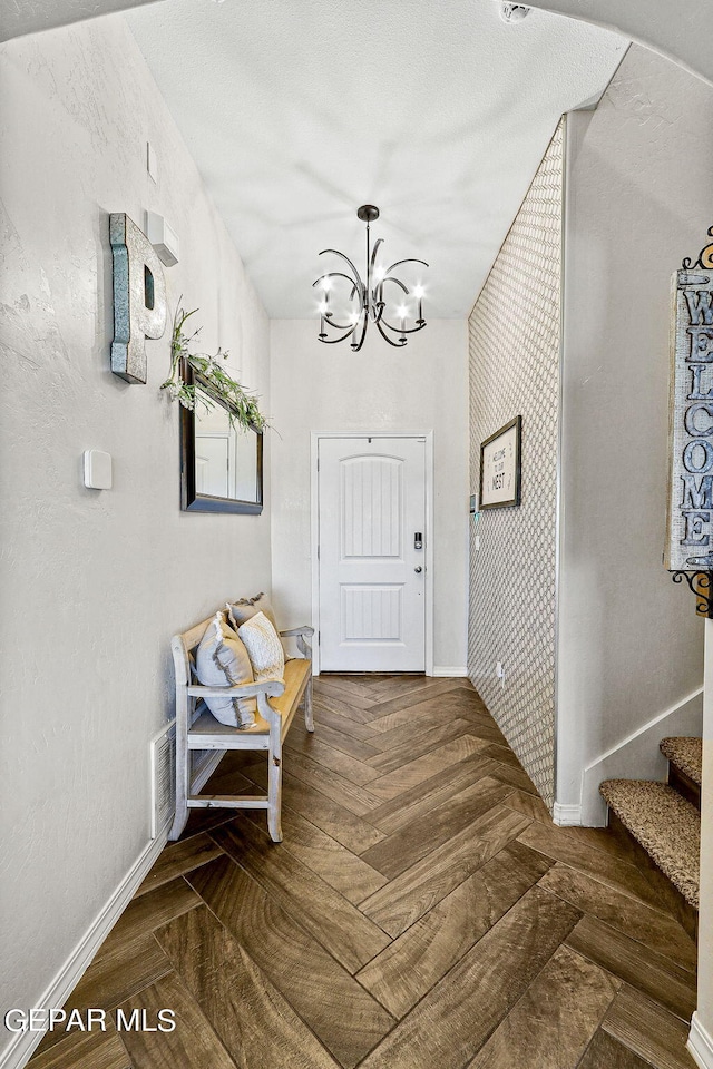 interior space featuring dark parquet flooring