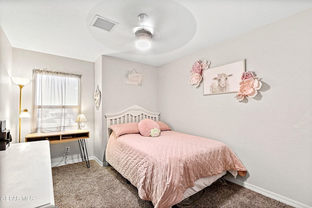 bedroom with dark carpet and ceiling fan