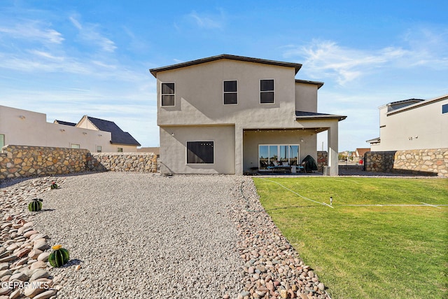 view of front of property with a front lawn and a patio area