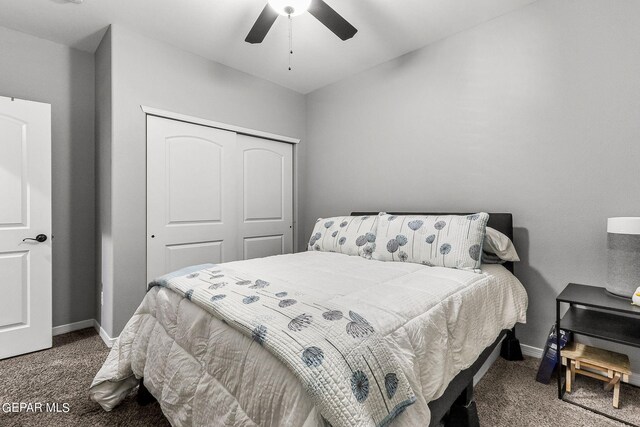 bedroom with ceiling fan, a closet, and carpet flooring