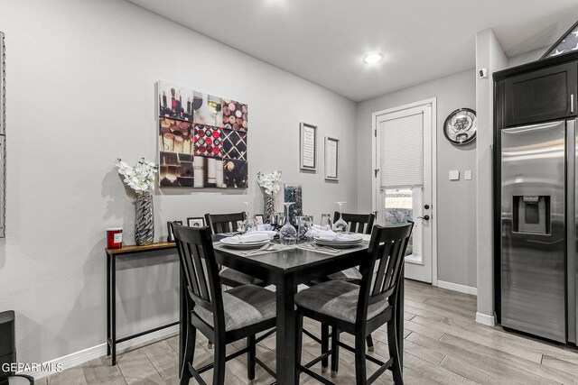 dining room featuring light hardwood / wood-style floors