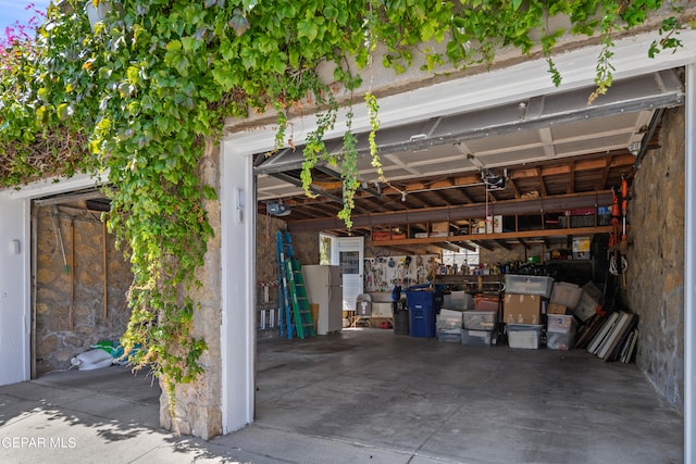 garage with white fridge