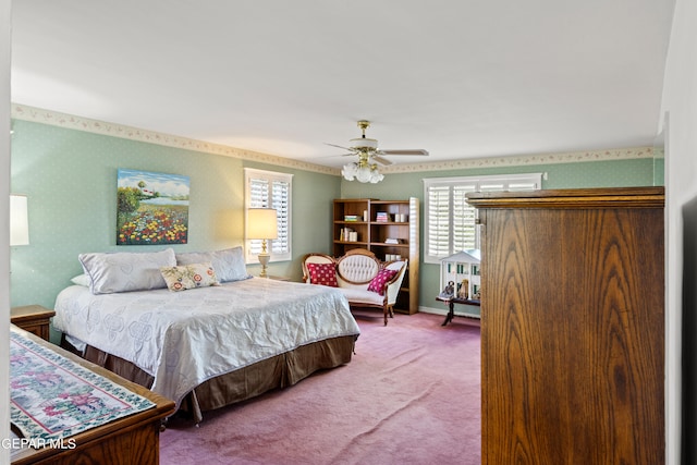 carpeted bedroom with multiple windows and ceiling fan