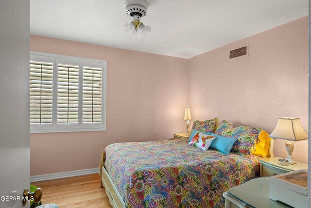 bedroom featuring light hardwood / wood-style floors