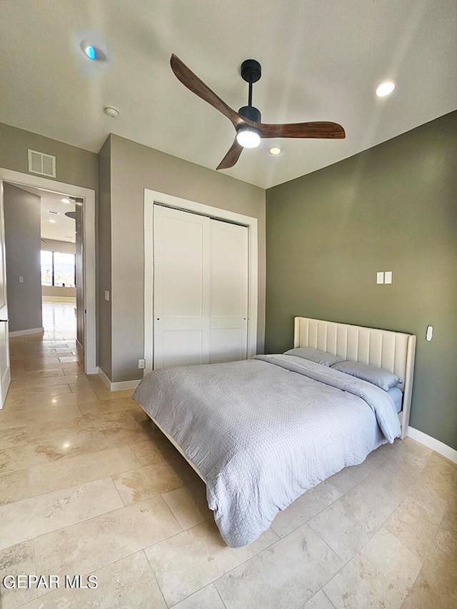 bedroom featuring a closet and ceiling fan