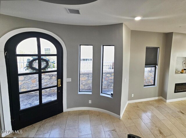 foyer featuring light wood-type flooring