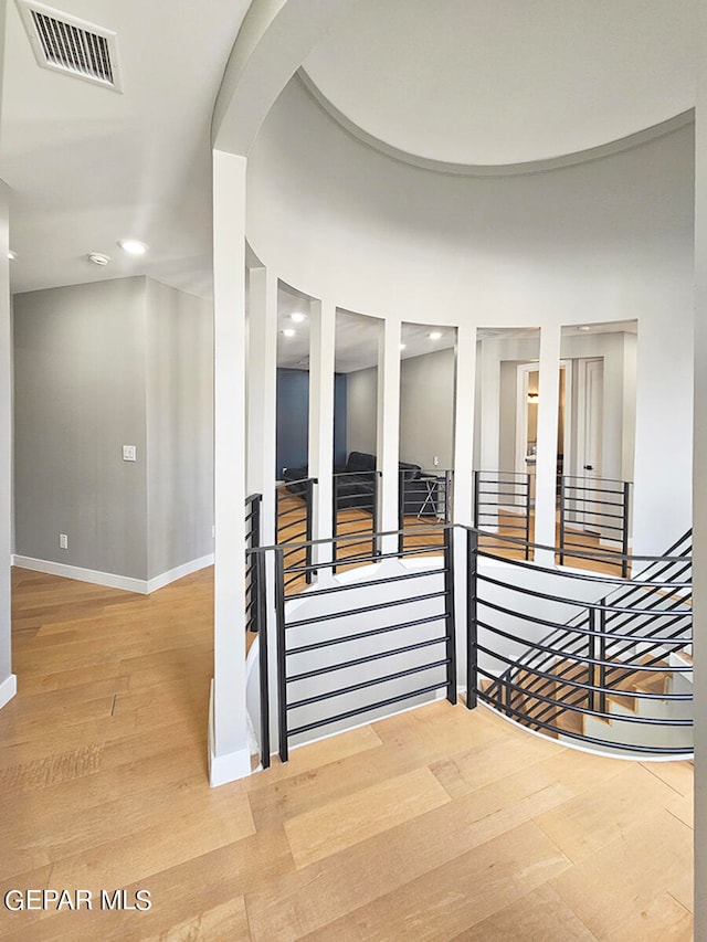 staircase featuring hardwood / wood-style flooring