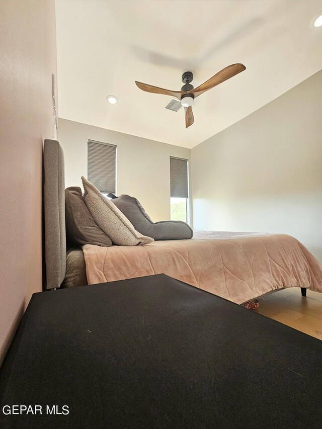 bedroom featuring ceiling fan