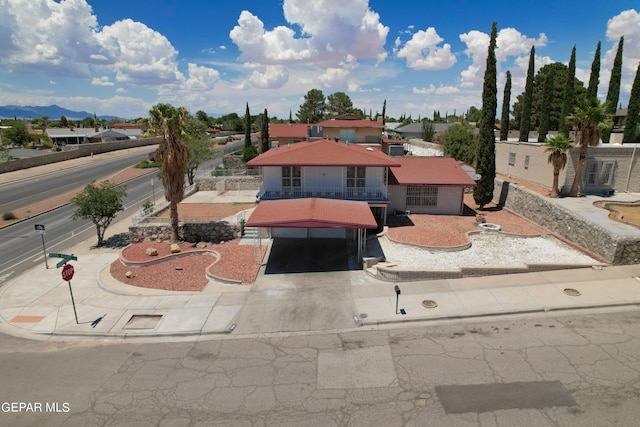 view of front of home featuring a mountain view