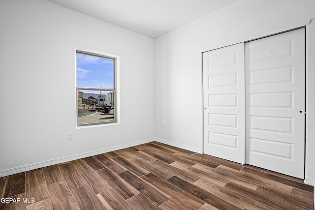 unfurnished bedroom with a closet