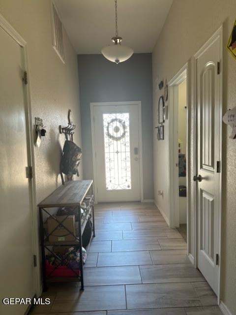 entryway with light wood-type flooring