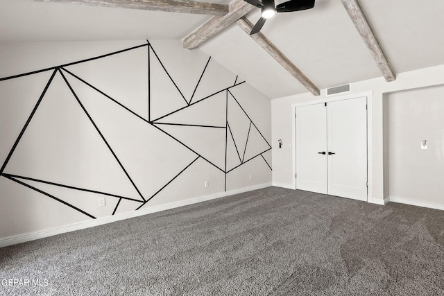 interior space featuring carpet, a closet, vaulted ceiling with beams, and ceiling fan