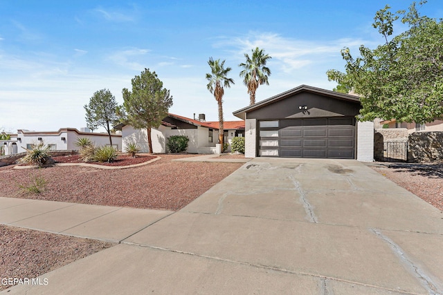 ranch-style home with a garage