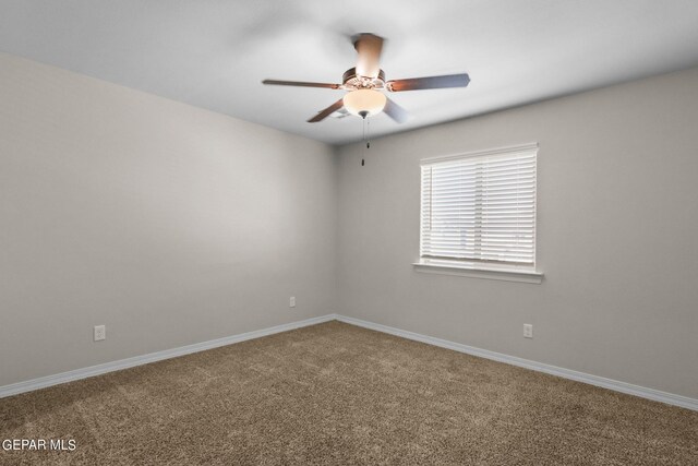 unfurnished room featuring carpet and ceiling fan