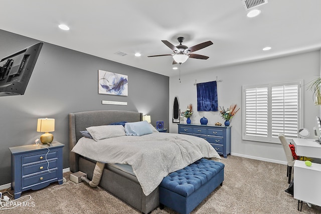 bedroom with ceiling fan and carpet floors