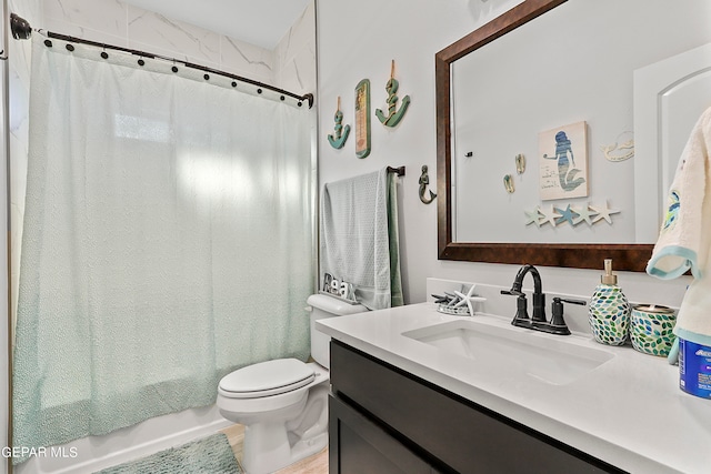 full bathroom with vanity, toilet, and shower / bath combo