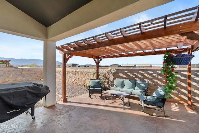 view of patio with a pergola, an outdoor living space, area for grilling, and a mountain view