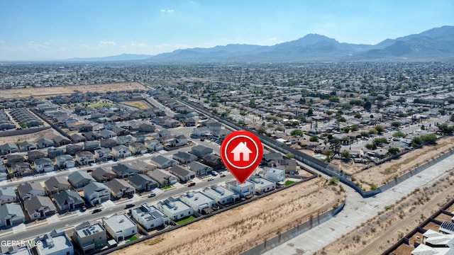 drone / aerial view featuring a mountain view