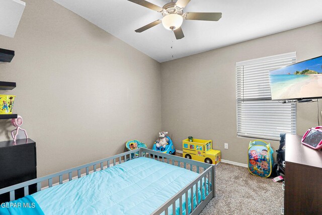 carpeted bedroom featuring ceiling fan