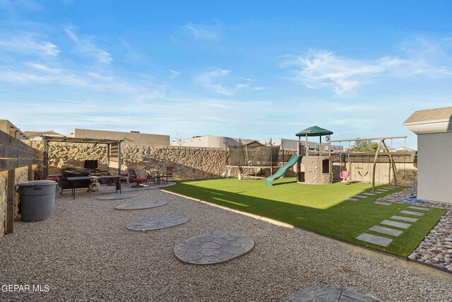 view of yard featuring a playground