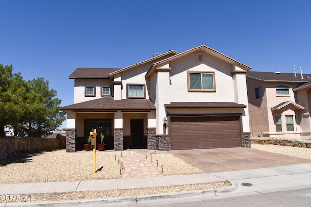 view of front of property with a garage