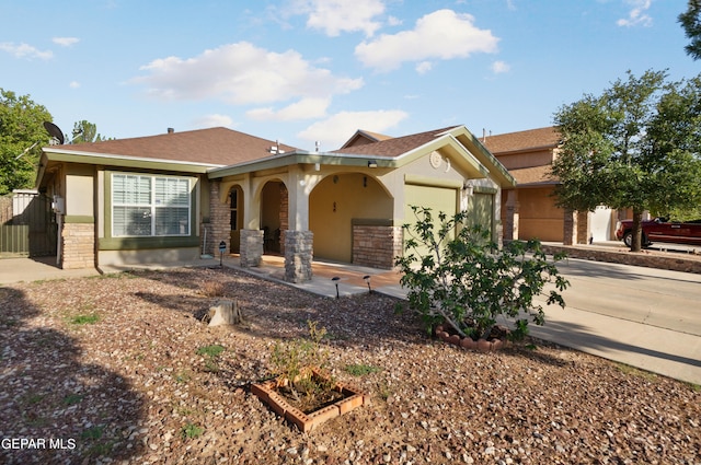 ranch-style home with a garage